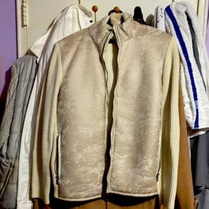 Warm jacket with double layer inside , great tan color makes  outfit look awesom